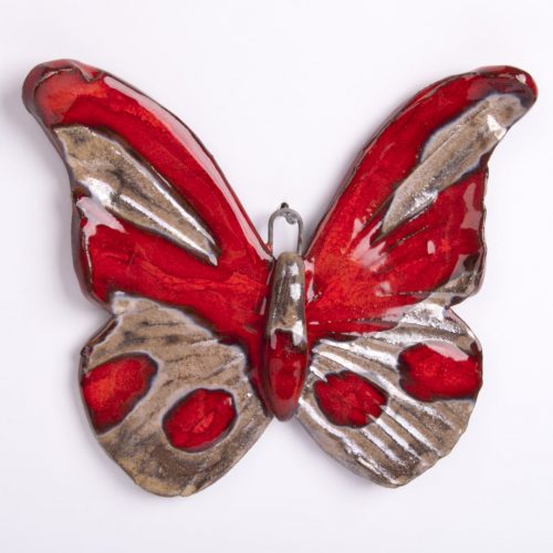 Egzotyczny motyl w czerwieni i piasku wiszący naścienny